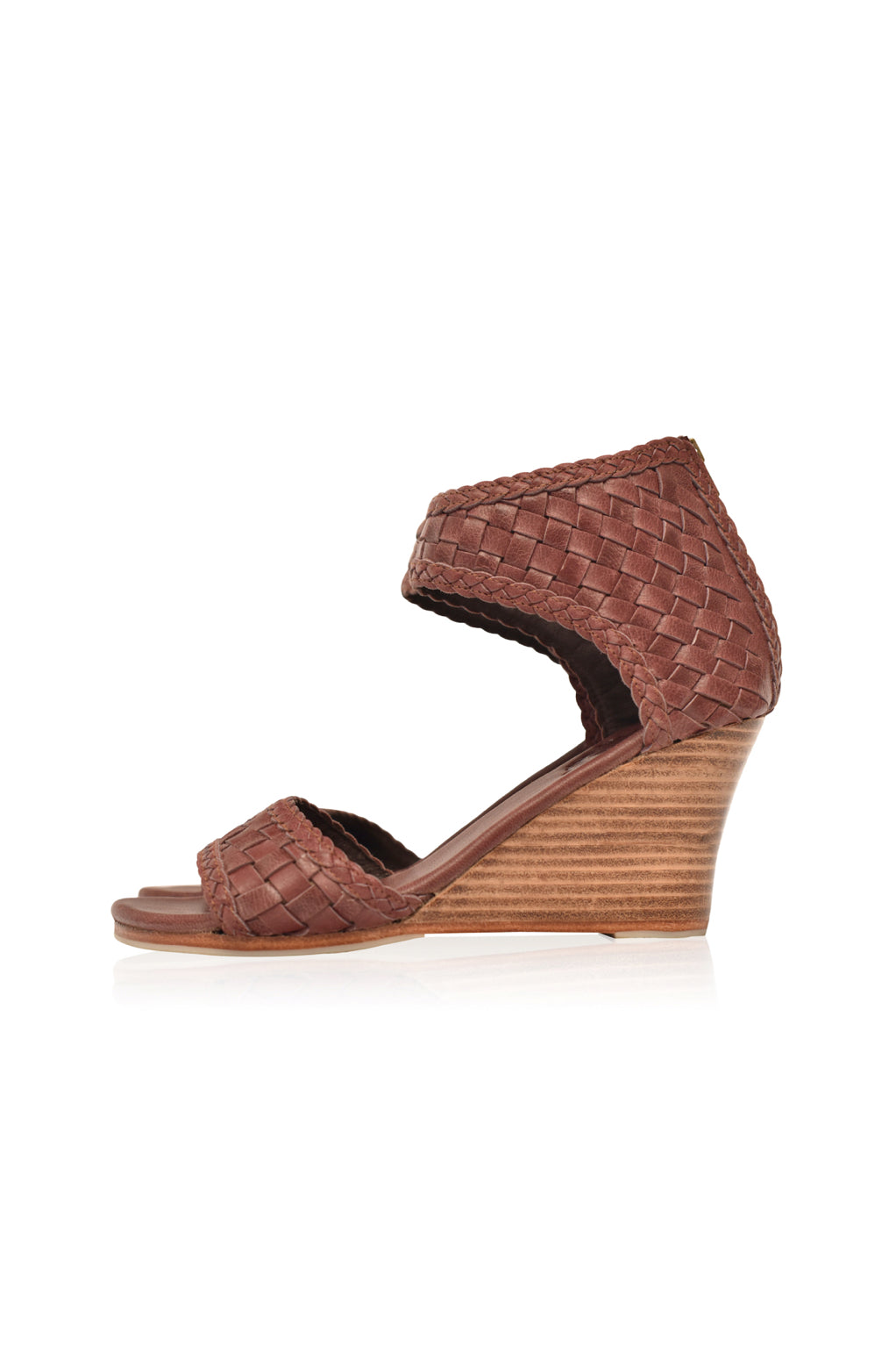 Athena Leather Wedges showcasing woven leather design with braided detailing and a wooden wedge heel.