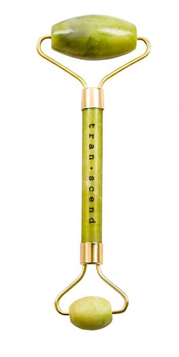 Authentic Jade Facial Roller made from pure jadeite, featuring a smooth, green surface and dual-ended design for facial massage.