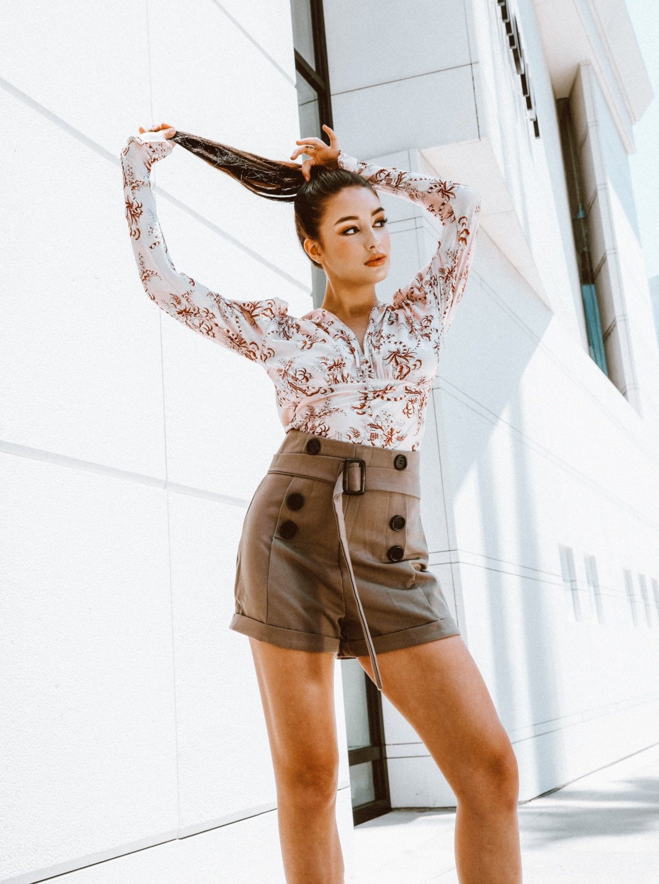 Ay, Ay Sailor Shorts featuring an ultra-high waist, belt detailing, and stylish black buttons on the sides.