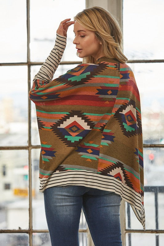 Azi Two Fer Poncho featuring a modern Aztec print, lightweight fabric, and stylish high neck design.