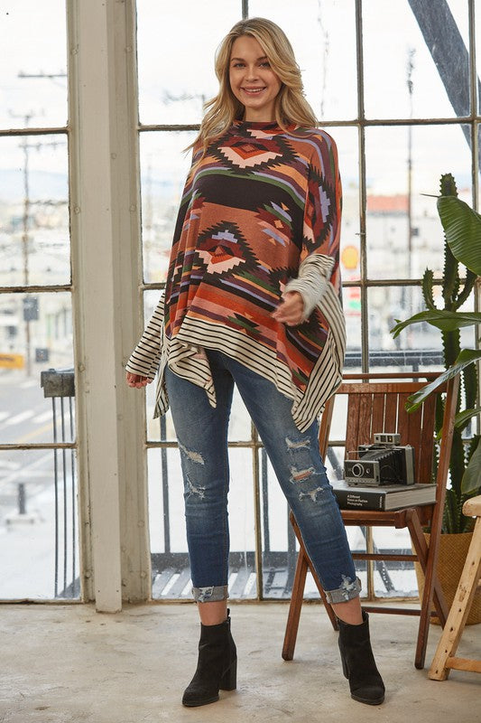 Azi Two Fer Poncho featuring a modern Aztec print, lightweight fabric, and stylish high neck design.