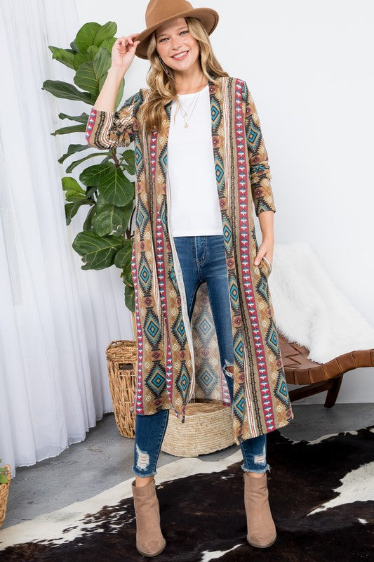 Aztec Print Duster Cardigan featuring an open front, long sleeves, and side pockets, made from cozy angora knit fabric.