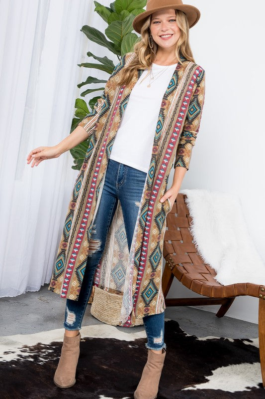 Aztec Print Duster Cardigan featuring an open front, long sleeves, and side pockets, made from cozy angora knit fabric.