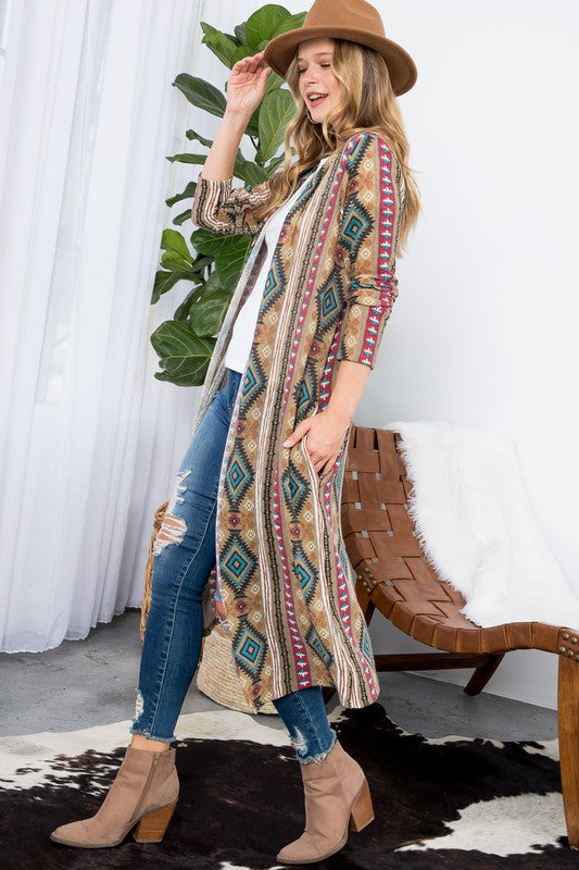 Aztec Print Duster Cardigan featuring an open front, long sleeves, and side pockets, made from cozy angora knit fabric.