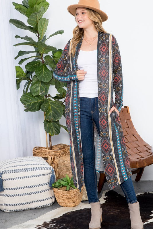 Aztec Print Duster Cardigan featuring an open front, long sleeves, and side pockets, made from cozy angora knit fabric.