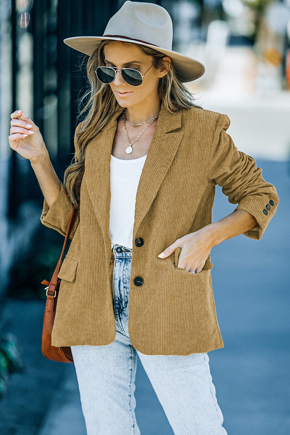 Back Slit Lapel Collar Corduroy Jacket in solid color with long sleeves and buttoned pockets.