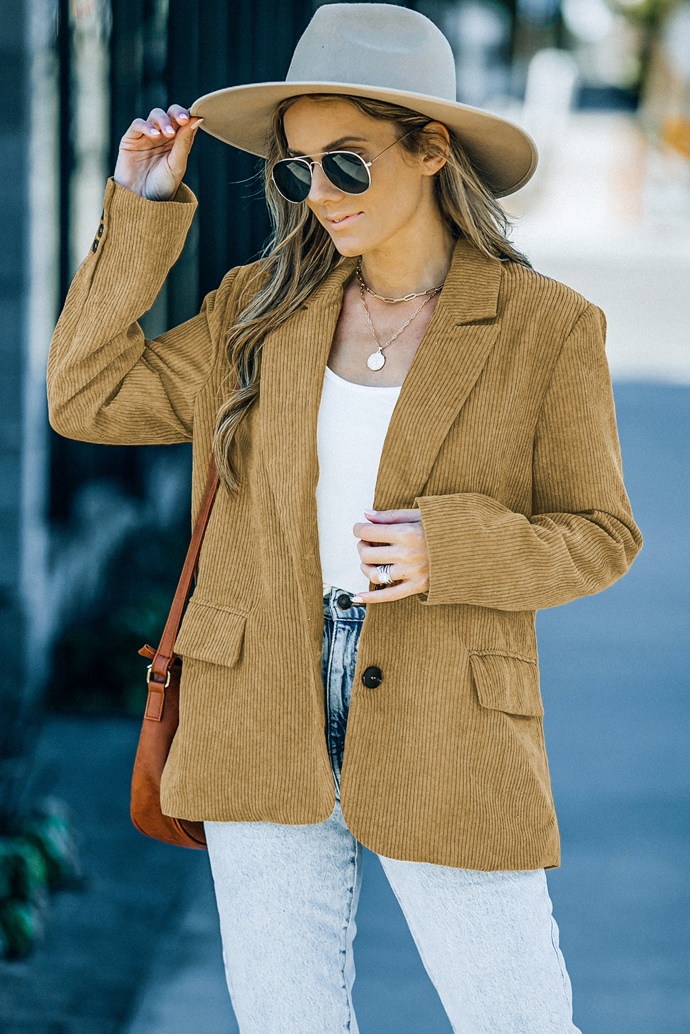 Back Slit Lapel Collar Corduroy Jacket in solid color with long sleeves and buttoned pockets.