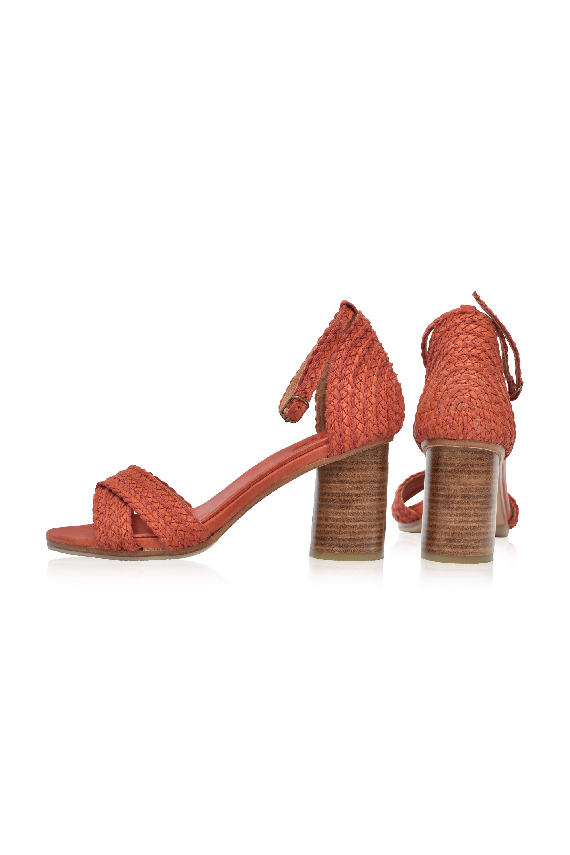 A pair of Bahamas Block Heel Sandals featuring a woven design, adjustable ankle strap, and a 7 cm wooden heel, perfect for stylish comfort.