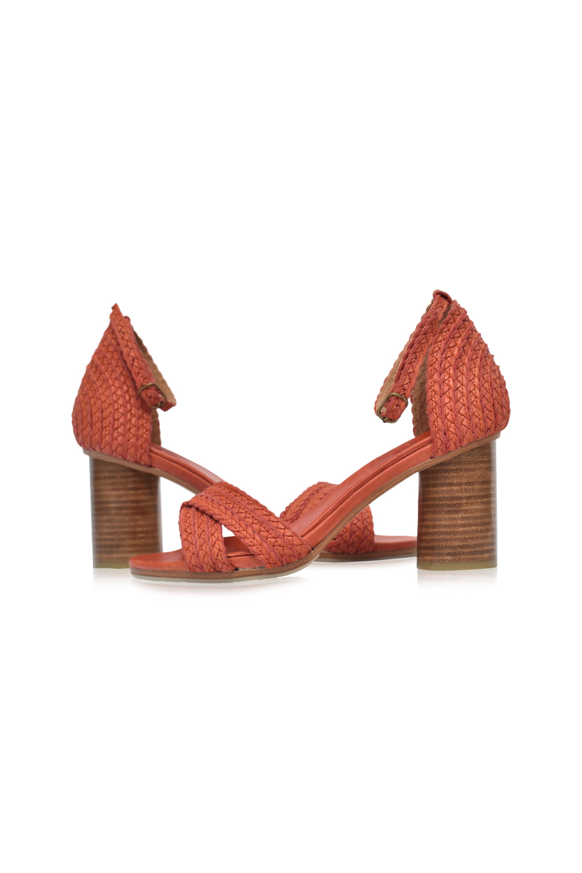 A pair of Bahamas Block Heel Sandals featuring a woven design, adjustable ankle strap, and a 7 cm wooden heel, perfect for stylish comfort.