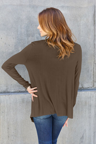 Basic Bae Full Size Open Front Long Sleeve Cardigan in a neutral color, showcasing its open front design and long sleeves.