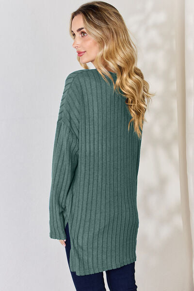 Basic Bae Full Size Ribbed Half Button Long Sleeve T-Shirt in a stylish high-low design, showcasing its ribbed texture and button detail.