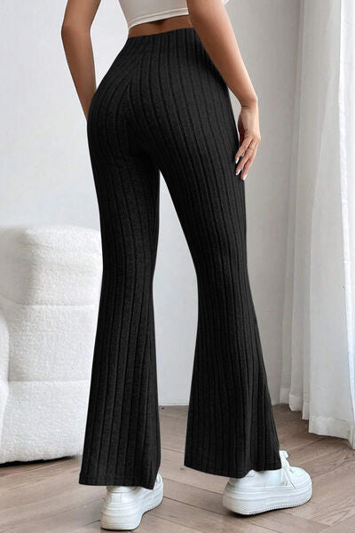 Basic Bae Full Size Ribbed High Waist Flare Pants in black, showcasing ribbed texture and high waist design.