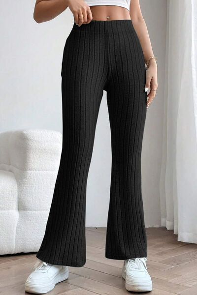 Basic Bae Full Size Ribbed High Waist Flare Pants in black, showcasing ribbed texture and high waist design.