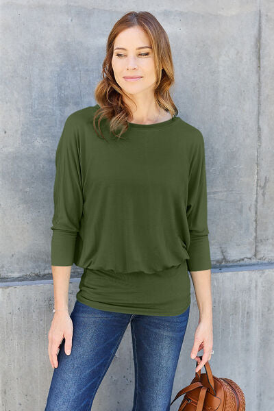 Basic Bae Full Size Round Neck Batwing Sleeve Blouse in a stylish design, showcasing its round neck and batwing sleeves.