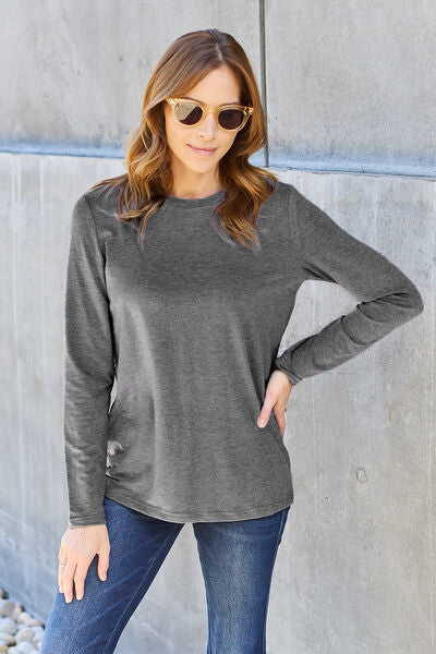 Basic Bae Full Size Round Neck Long Sleeve Top in various sizes, showcasing its classic design and soft fabric.