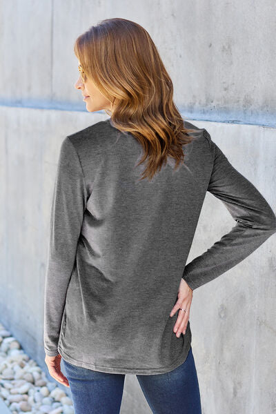 Basic Bae Full Size Round Neck Long Sleeve Top in various sizes, showcasing its classic design and soft fabric.