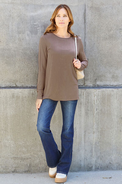 Basic Bae Full Size Round Neck Long Sleeve Top in various sizes, showcasing its classic design and soft fabric.