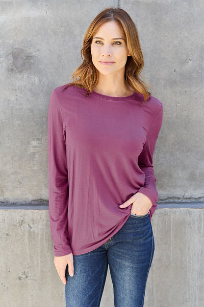 Basic Bae Full Size Round Neck Long Sleeve Top in various sizes, showcasing its classic design and soft fabric.