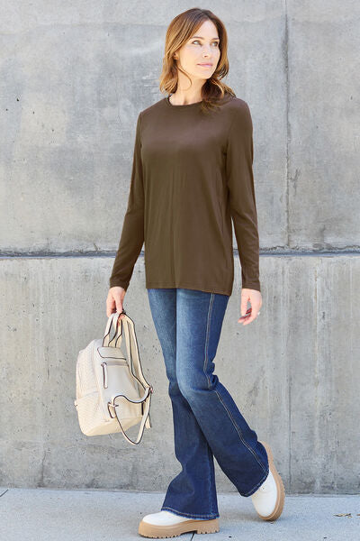 Basic Bae Full Size Round Neck Long Sleeve Top in various sizes, showcasing its classic design and soft fabric.