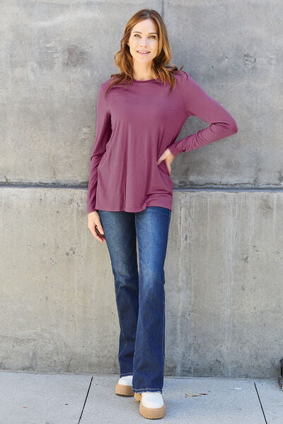 Basic Bae Full Size Round Neck Long Sleeve Top in various sizes, showcasing its classic design and soft fabric.