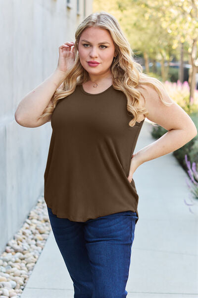 Basic Bae Full Size Round Neck Tank in various sizes, showcasing its round neck design and soft fabric.