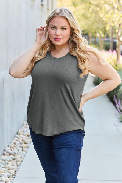 Basic Bae Full Size Round Neck Tank in various sizes, showcasing its round neck design and soft fabric.