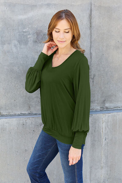 Basic Bae Full Size V-Neck Lantern Sleeve Blouse in soft fabric with elegant lantern sleeves.