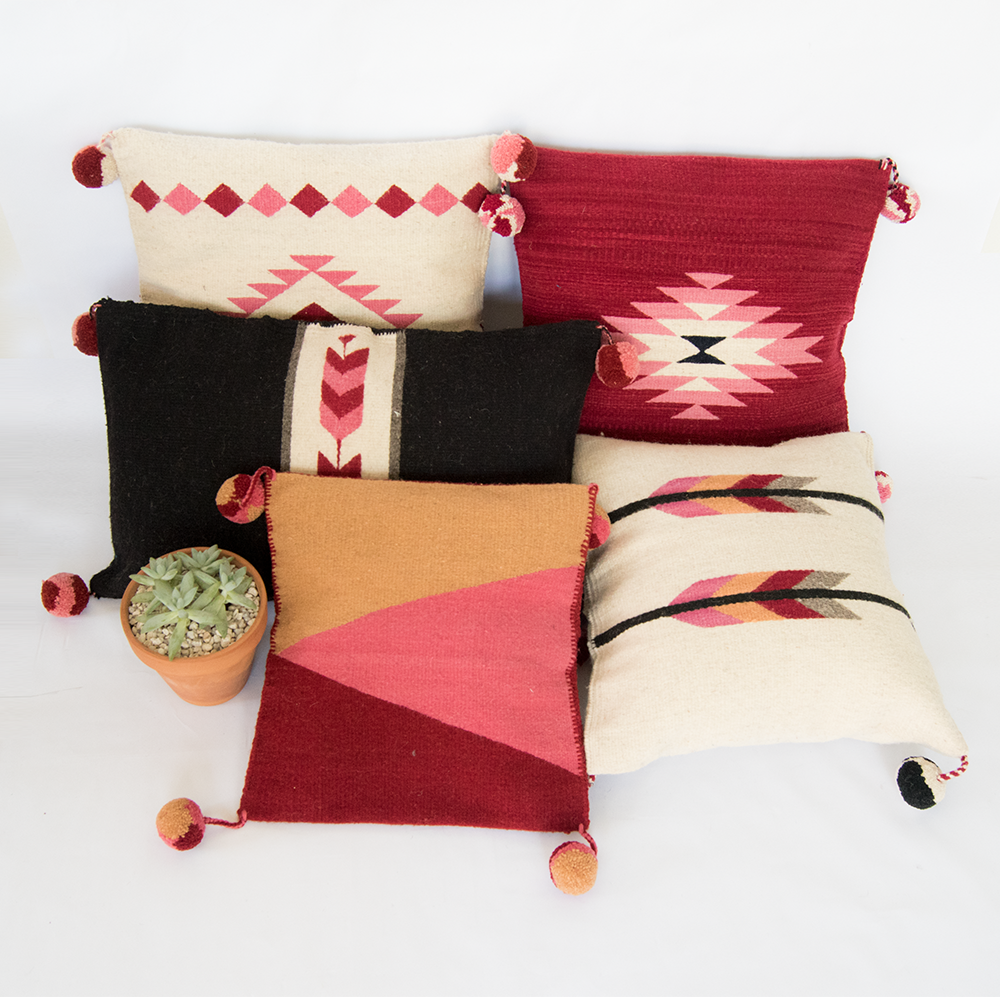 Baxa Native American Pillow Cover featuring pink arrows design, handcrafted from wool and cotton, showcasing traditional weaving techniques.