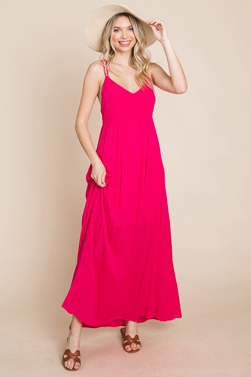 A beautiful Beach Maxi Bridesmaid Dress featuring a criss cross back, high waist, and A-line silhouette, perfect for summer weddings.