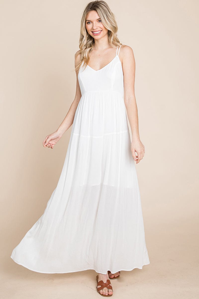 A beautiful Beach Maxi Bridesmaid Dress featuring a criss cross back, high waist, and A-line silhouette, perfect for summer weddings.