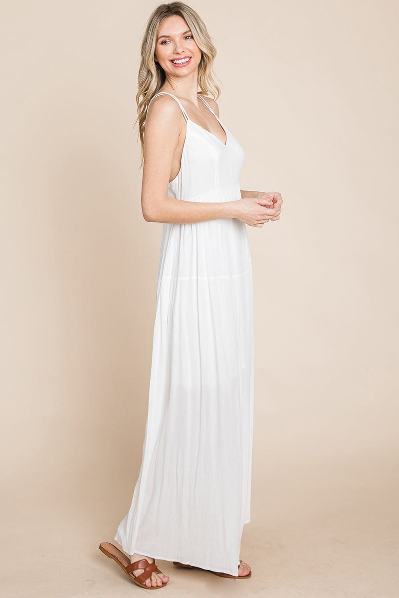 A beautiful Beach Maxi Bridesmaid Dress featuring a criss cross back, high waist, and A-line silhouette, perfect for summer weddings.