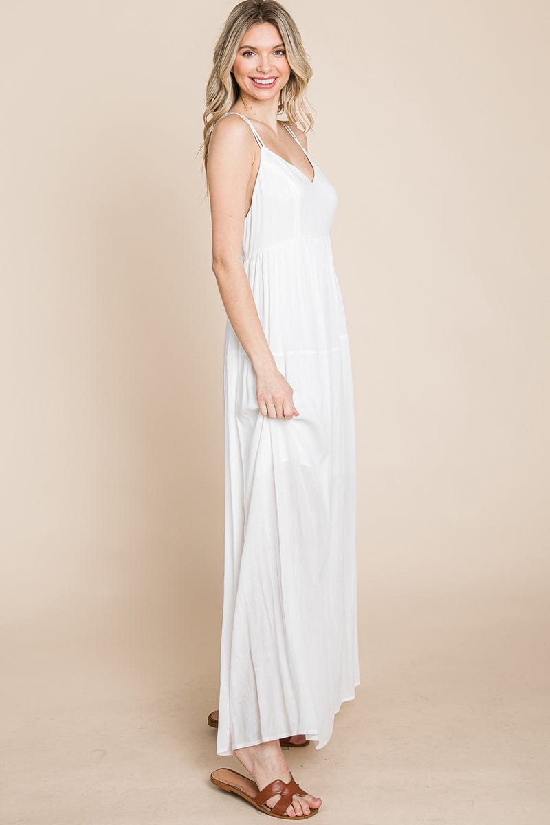 A beautiful Beach Maxi Bridesmaid Dress featuring a criss cross back, high waist, and A-line silhouette, perfect for summer weddings.