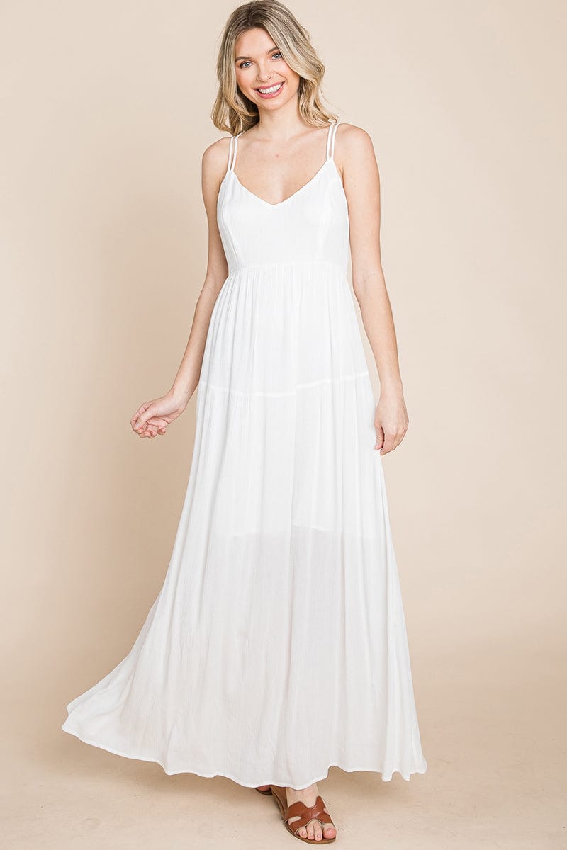 A beautiful Beach Maxi Bridesmaid Dress featuring a criss cross back, high waist, and A-line silhouette, perfect for summer weddings.