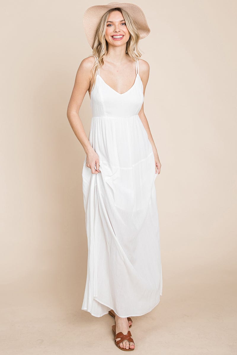 A beautiful Beach Maxi Bridesmaid Dress featuring a criss cross back, high waist, and A-line silhouette, perfect for summer weddings.