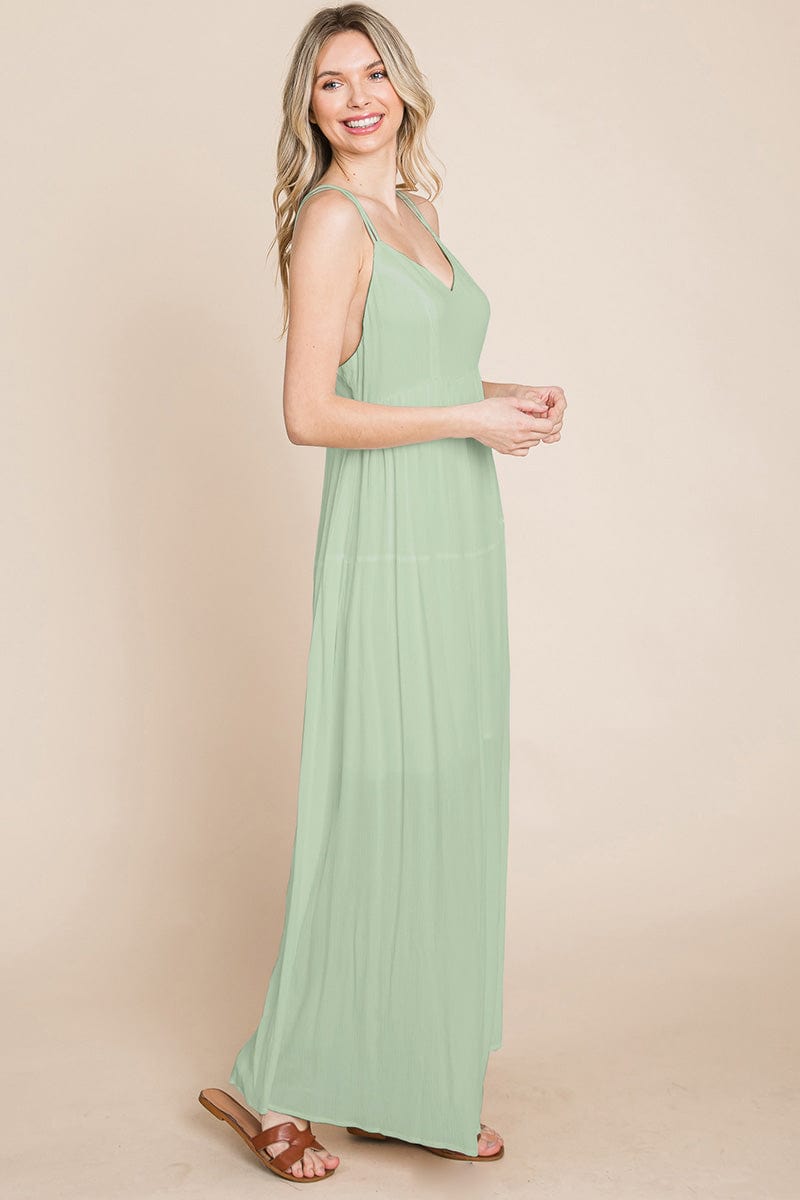 A beautiful Beach Maxi Bridesmaid Dress featuring a criss cross back, high waist, and A-line silhouette, perfect for summer weddings.