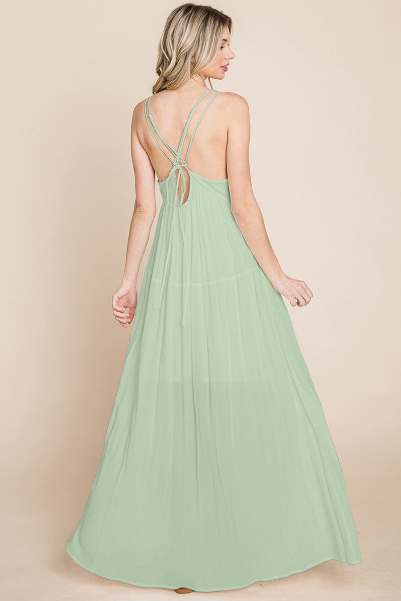 A beautiful Beach Maxi Bridesmaid Dress featuring a criss cross back, high waist, and A-line silhouette, perfect for summer weddings.