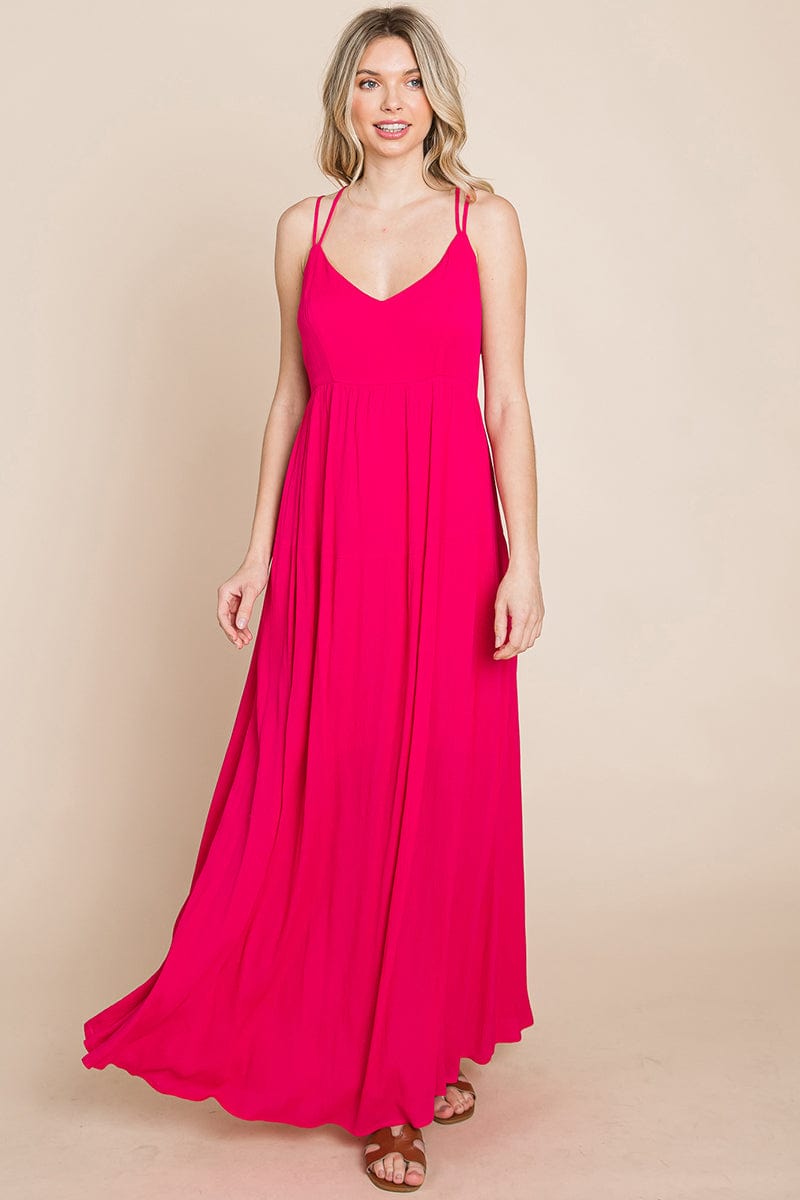 A beautiful Beach Maxi Bridesmaid Dress featuring a criss cross back, high waist, and A-line silhouette, perfect for summer weddings.