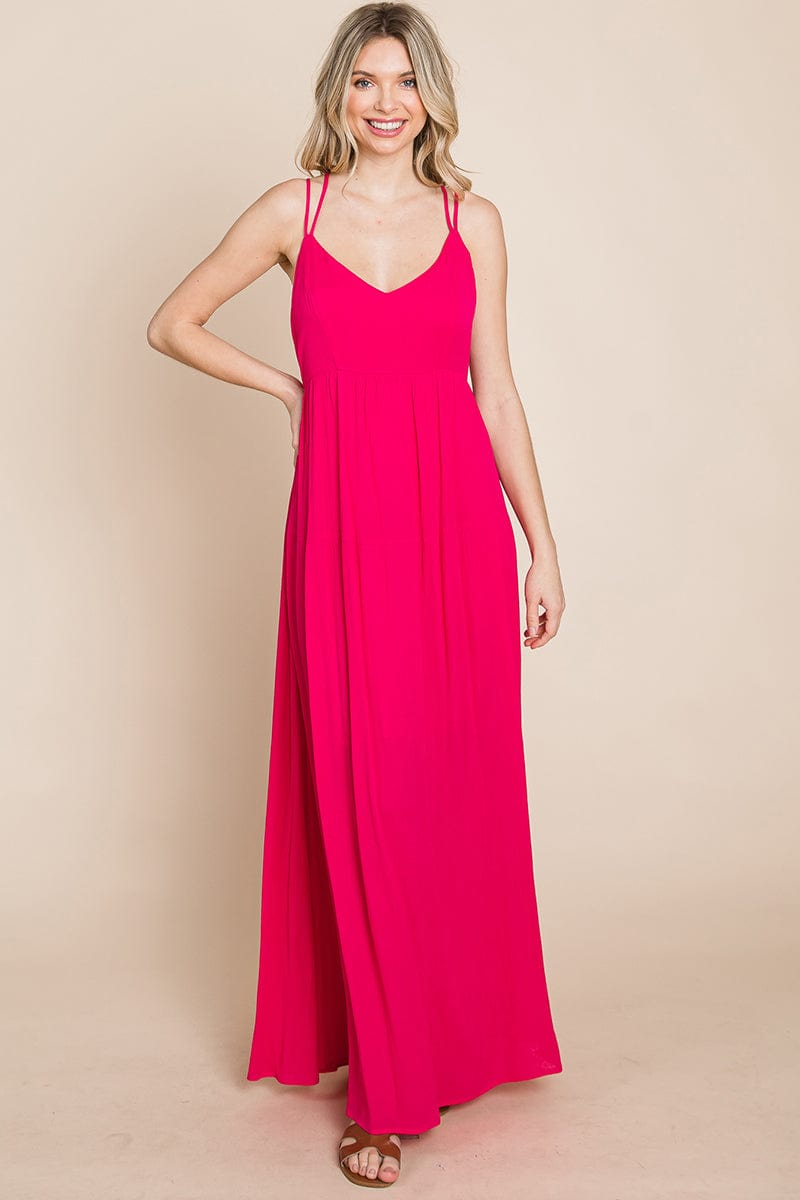 A beautiful Beach Maxi Bridesmaid Dress featuring a criss cross back, high waist, and A-line silhouette, perfect for summer weddings.