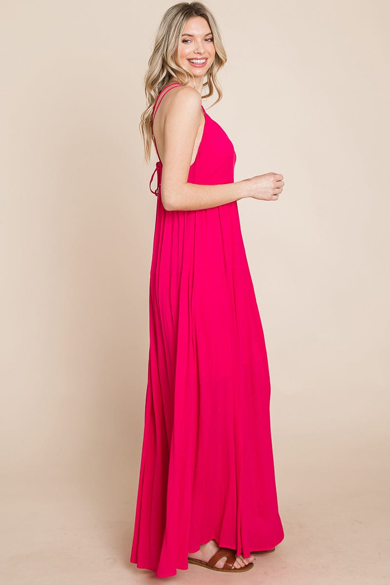 A beautiful Beach Maxi Bridesmaid Dress featuring a criss cross back, high waist, and A-line silhouette, perfect for summer weddings.