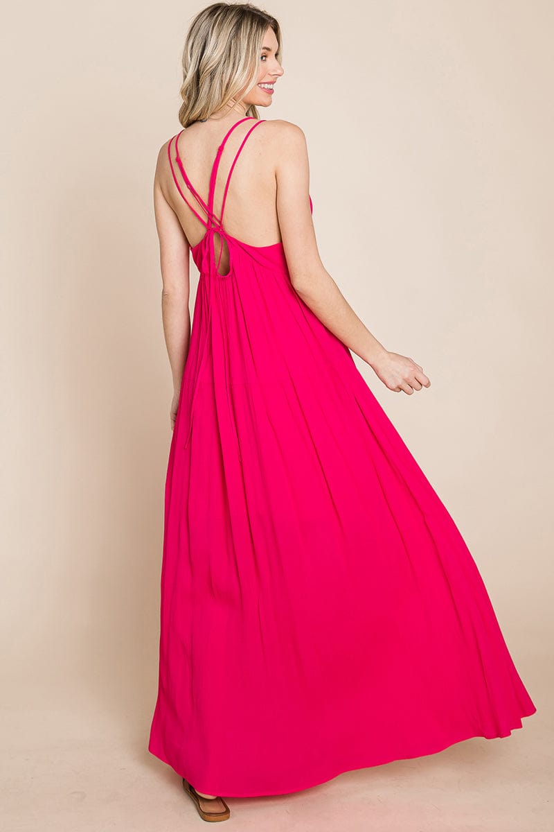 A beautiful Beach Maxi Bridesmaid Dress featuring a criss cross back, high waist, and A-line silhouette, perfect for summer weddings.