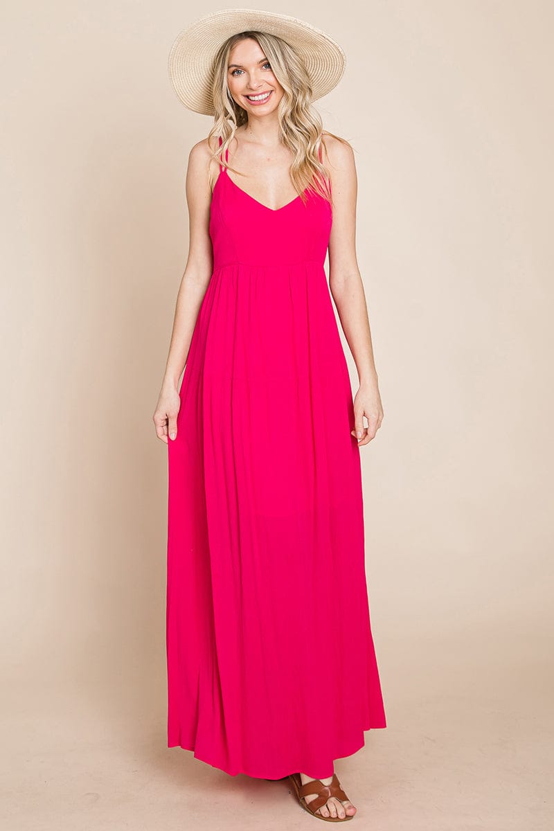 A beautiful Beach Maxi Bridesmaid Dress featuring a criss cross back, high waist, and A-line silhouette, perfect for summer weddings.