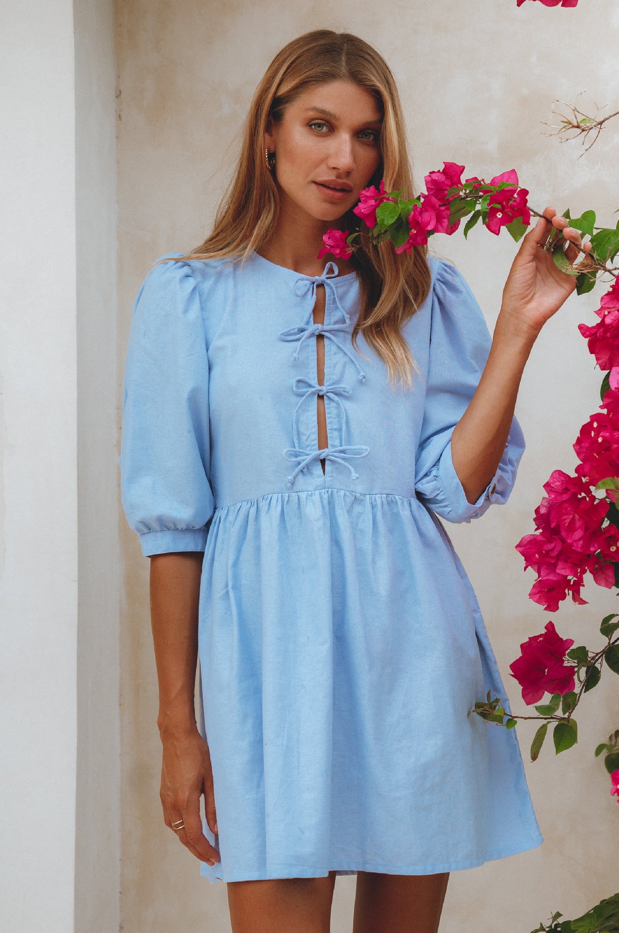 Beatrice Puff Sleeve Linen Mini Dress in vibrant summer colors, featuring adjustable ties and a babydoll silhouette.