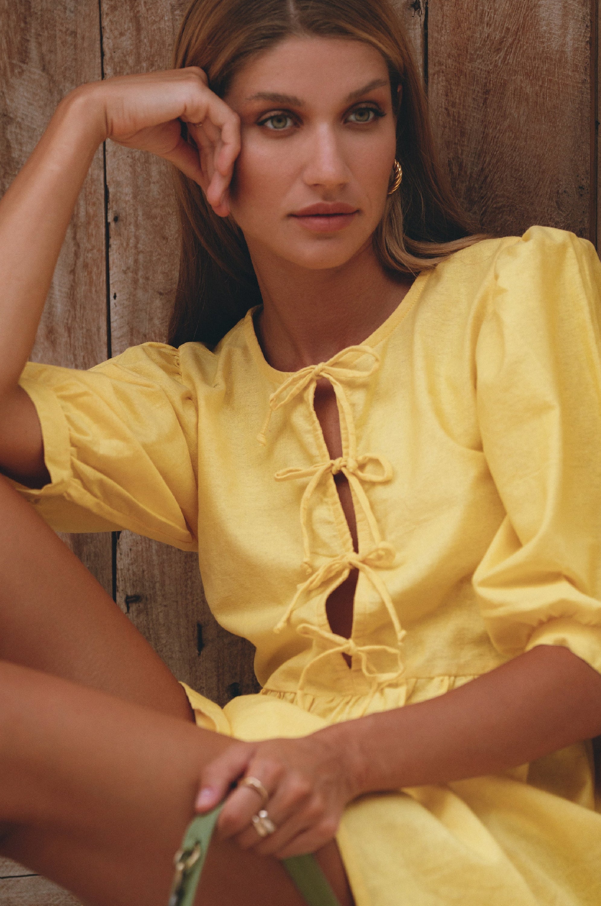 Beatrice Puff Sleeve Linen Mini Dress in vibrant summer colors, featuring adjustable ties and a babydoll silhouette.