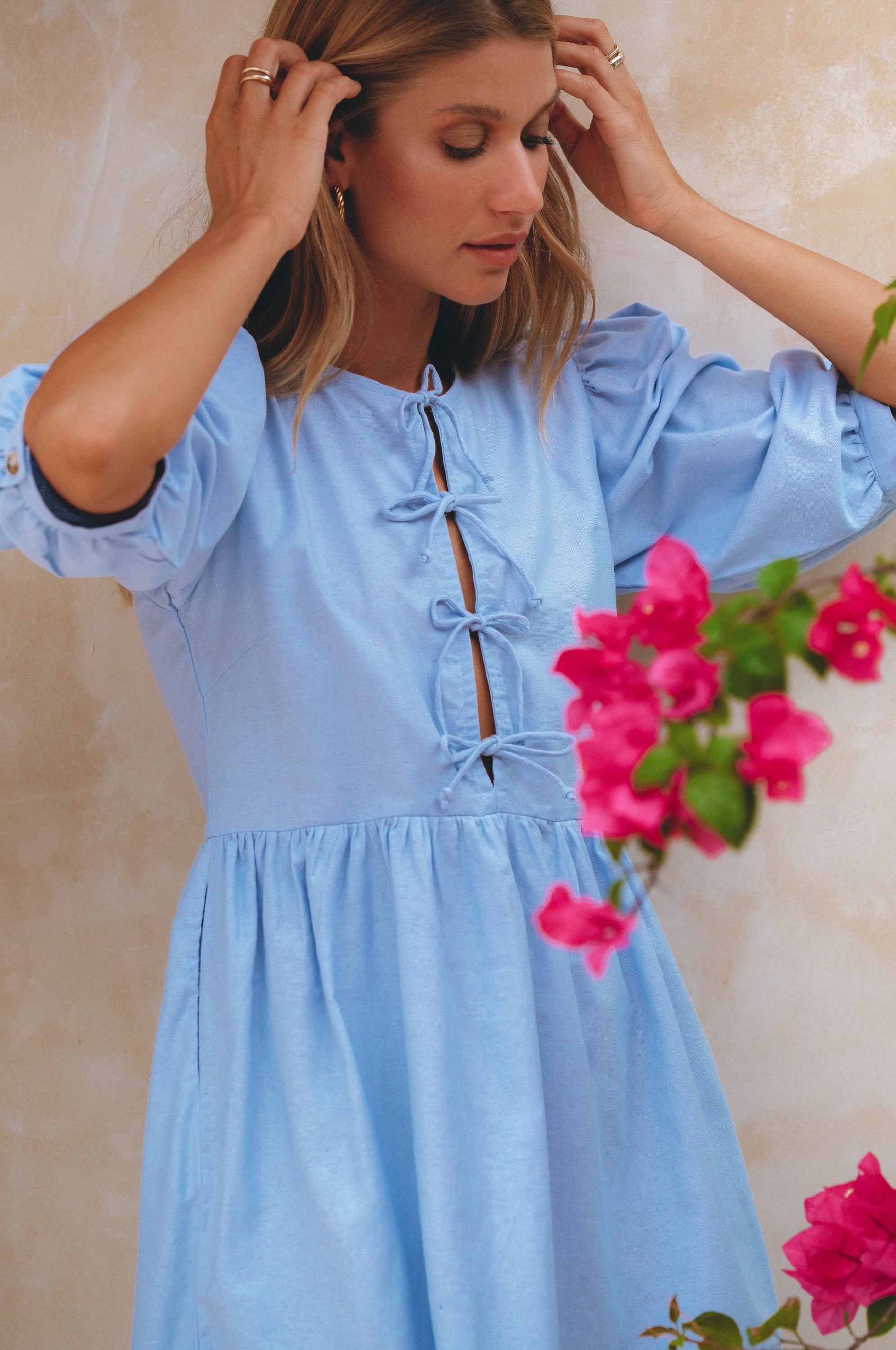 Beatrice Puff Sleeve Linen Mini Dress in vibrant summer colors, featuring adjustable ties and a babydoll silhouette.