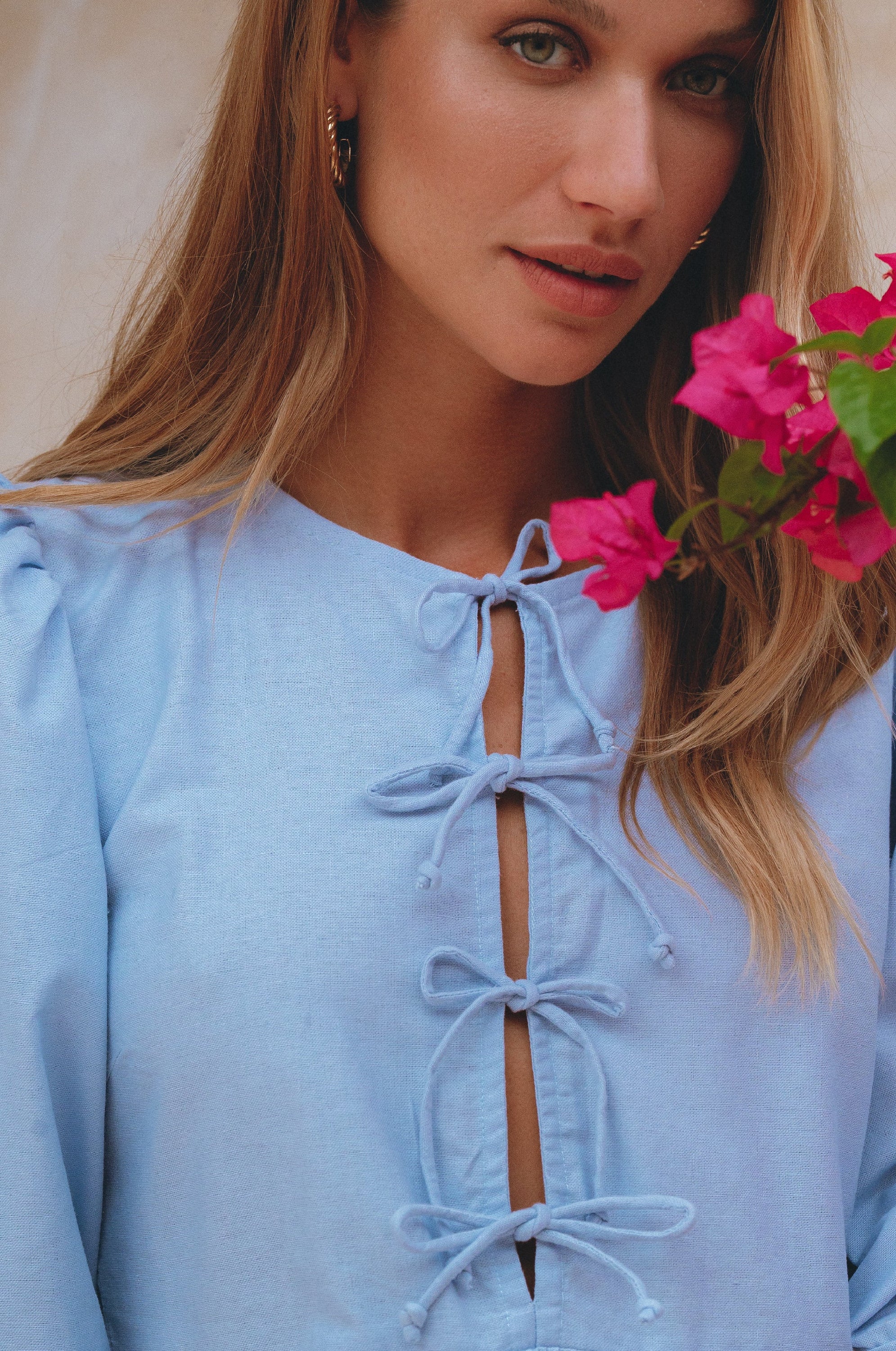 Beatrice Puff Sleeve Linen Mini Dress in vibrant summer colors, featuring adjustable ties and a babydoll silhouette.