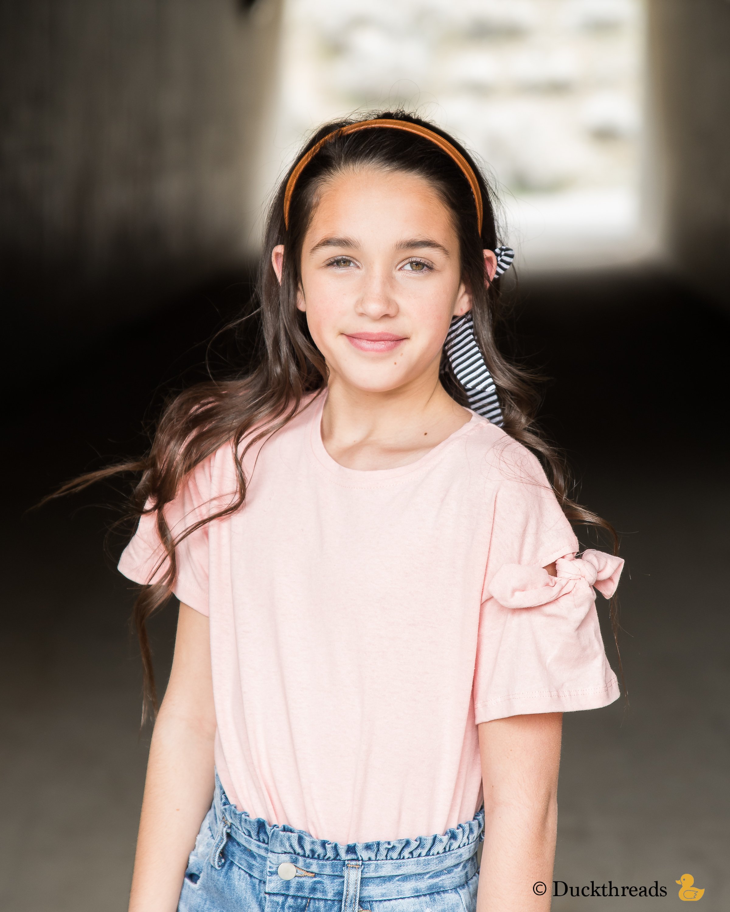 BeltBand reversible belt and headband made from leather and cotton fabric, showcasing black and white stripes.