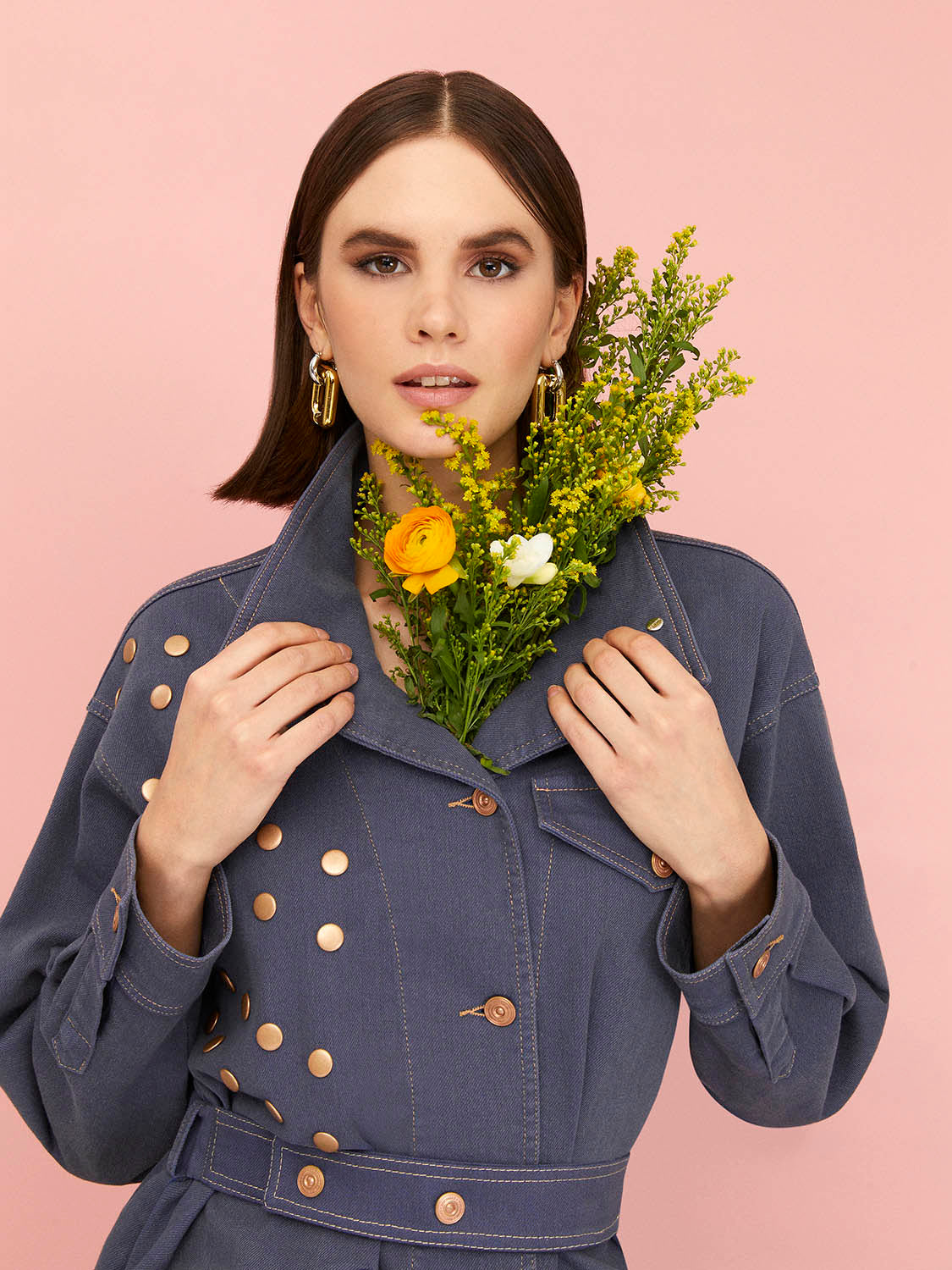 Stylish belted jacket with high collar, shoulder pads, and leopard print design.