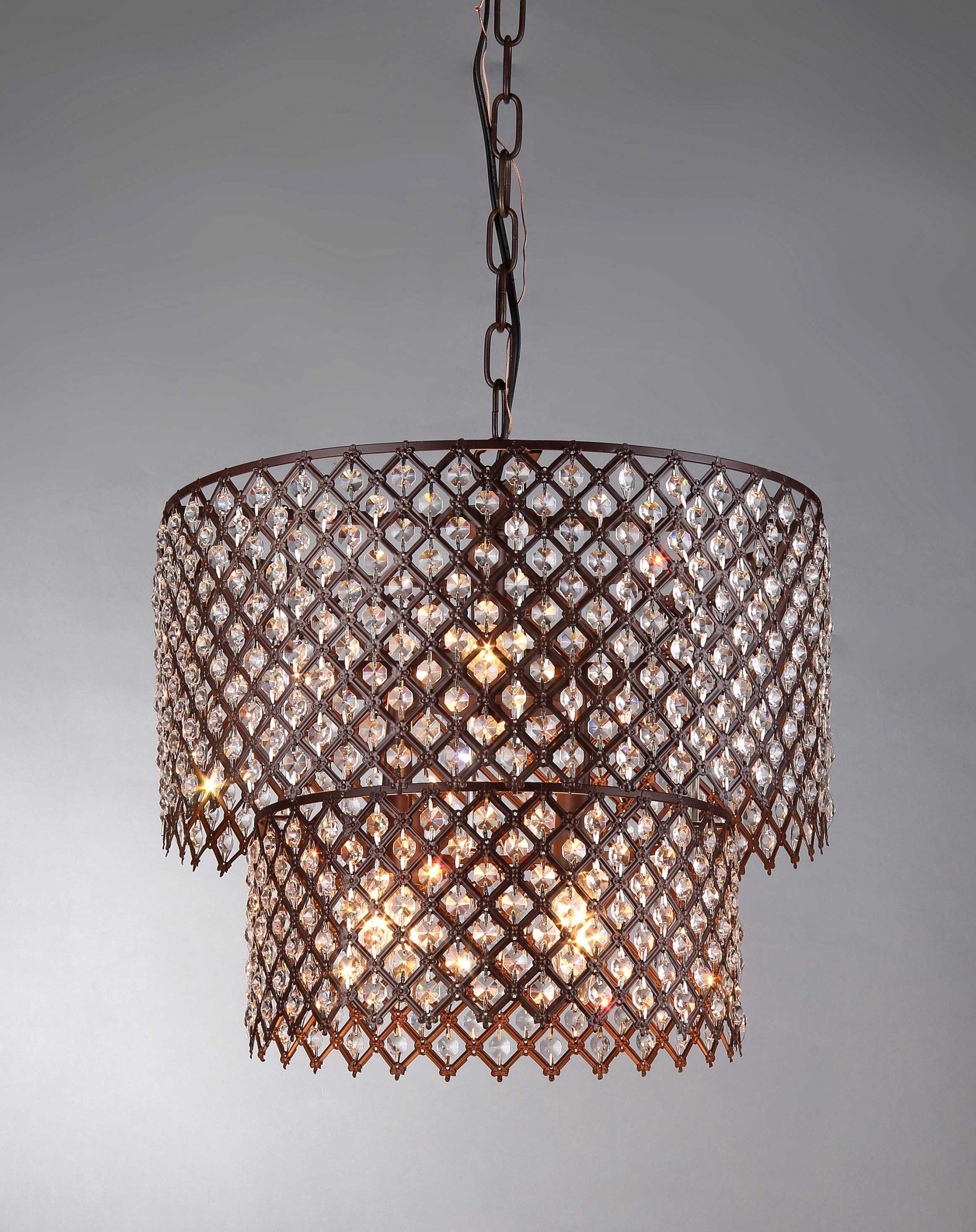 Bernadette Antique Bronze Chandelier with adjustable chain, showcasing elegant design and warm finish.