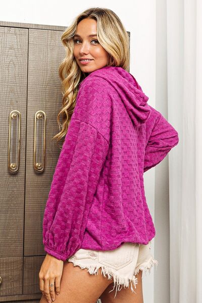 BiBi Brushed Checker Drawstring Long Sleeve Hoodie featuring a trendy checker pattern and adjustable hood.