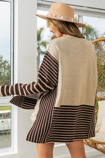 BiBi Striped Contrast Long Sleeve Slit Top featuring a unique striped design with side slits, perfect for casual or dressy occasions.